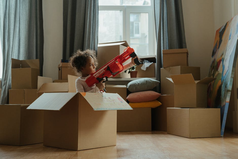 moving cardboard boxes stacked indoors