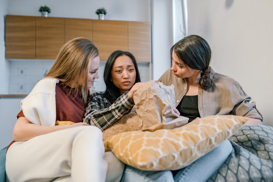 group of friends eating fried chicken at home party