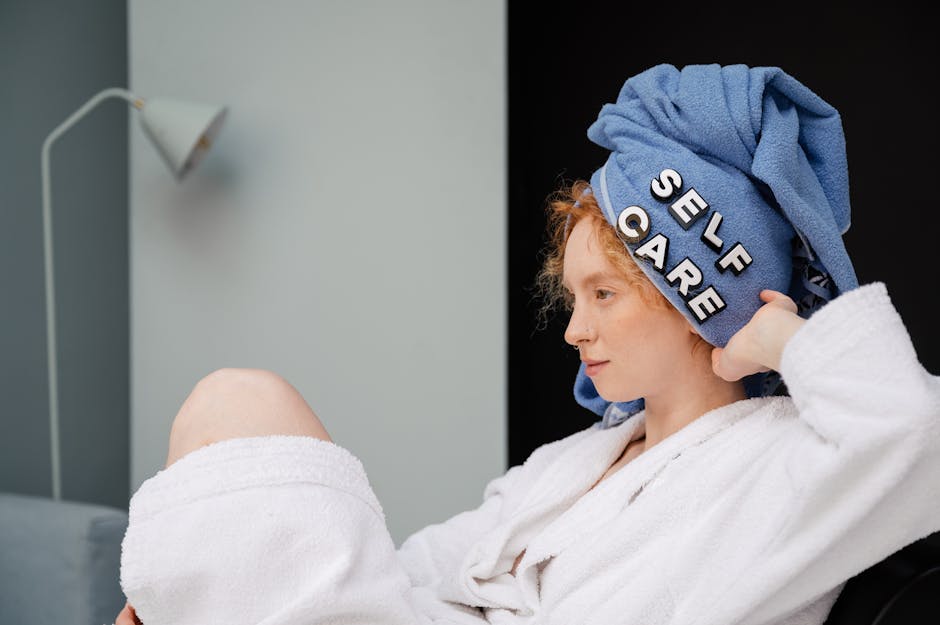 woman wrapping hair in towel