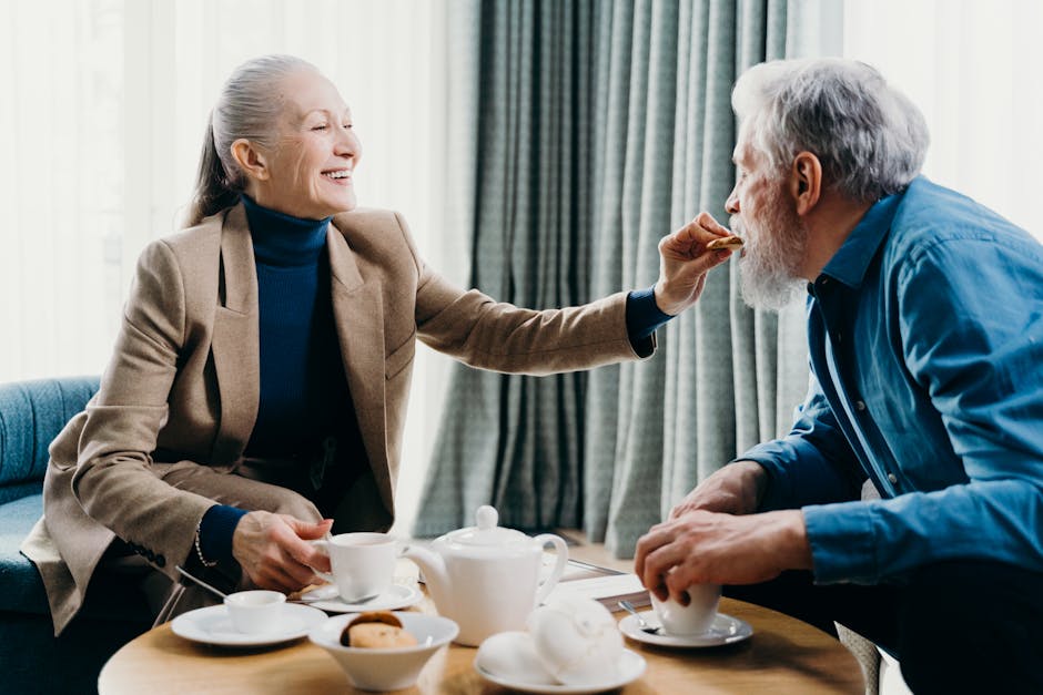 happy elderly couple drinking tea